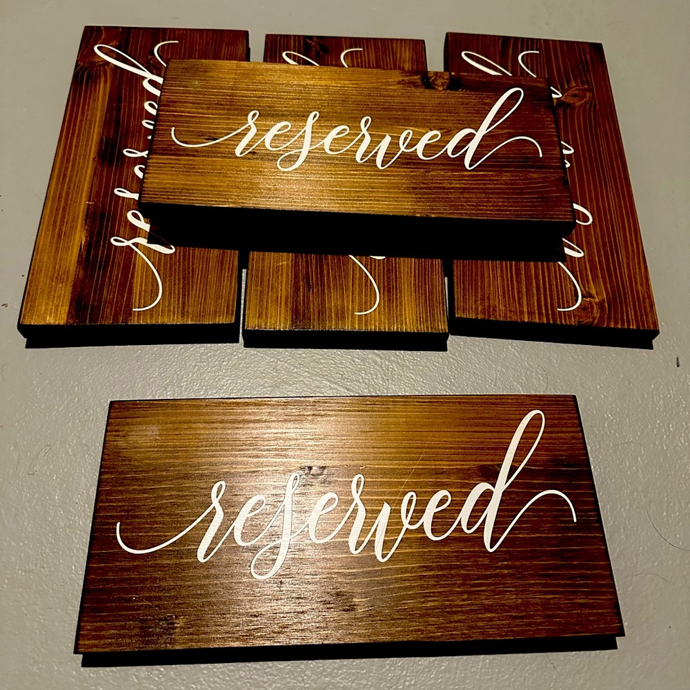 “Reserved” wood signs